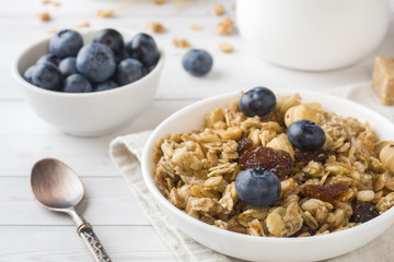 Oat flakes, granules and nuts muesli with blueberries. The concept of healthy food, Breakfast.