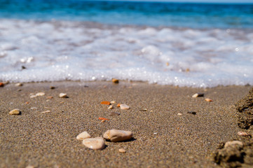 Sea beach on a sandy beach and stones