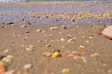 Sea beach on a sandy beach and stones