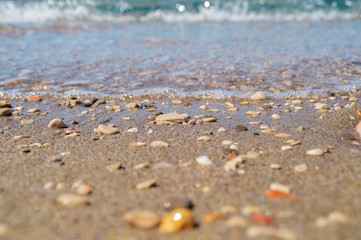 Fototapeta na wymiar Sea beach on a sandy beach and stones