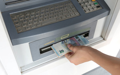 withdrawing cash from an ATM