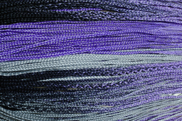 texture of thin colored African braids, hair texture