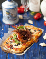 Delicious homemade pastries, Italian pizza with shrimps and spices, top view