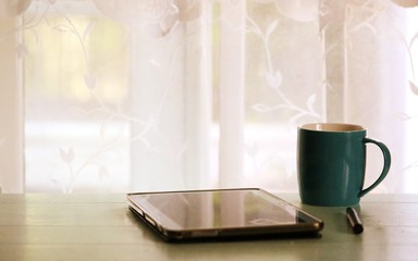 Interior home work desk closeup window blur background with vintage colors tones