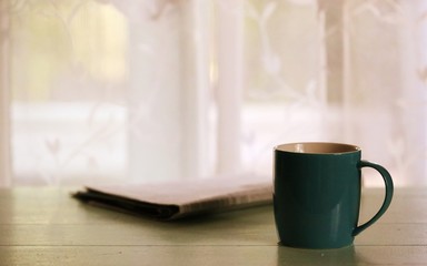 Interior home work desk closeup window blur background with vintage colors tones