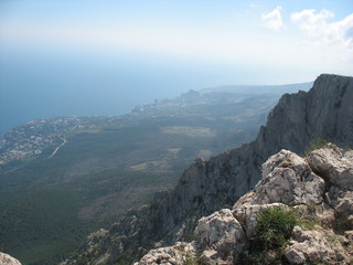 Fototapeta na wymiar Mountain nature, Crimean cliffs with a view of the sea and sky from the height of the mountain ai petri