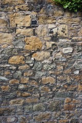 Ancient stone wall vertical abstract background
