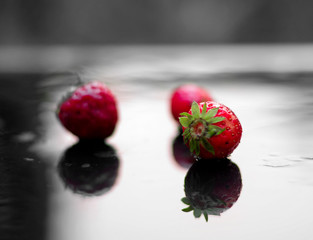 three red strawberries