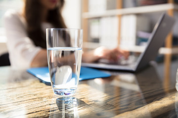 Glass Of Water On Desk