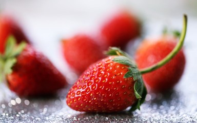 Fresh red strawberry closeup macro blur background