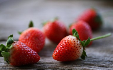 Fresh red strawberry closeup macro blur background