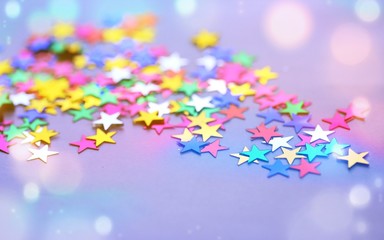 Colors of star decorations abstract blur background