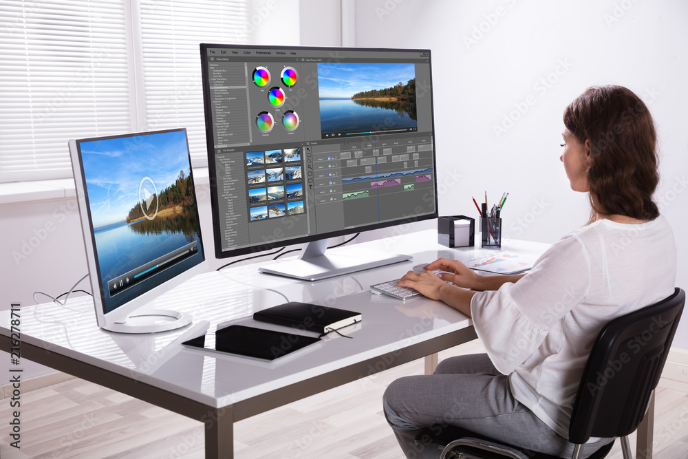 Poster Editor Editing Video On Computer