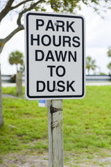 Park hours sign