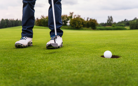 Golf Ball Falling Down At Hole After Putting