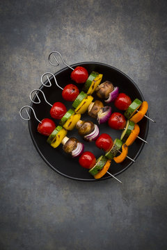 Vegetarian grill skewers on bowl