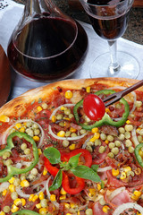 Pepperoni pizza and red wine