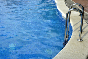 Swimming pool water. Blue water background