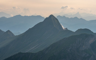 mountain peak during sunset golden hour the swiss alps, brienzer rothorn
