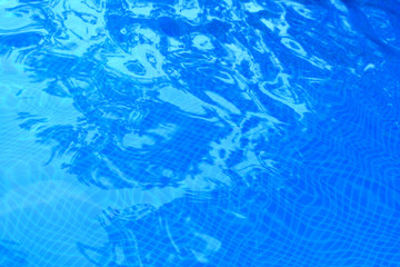 Swimming pool water. Blue water background