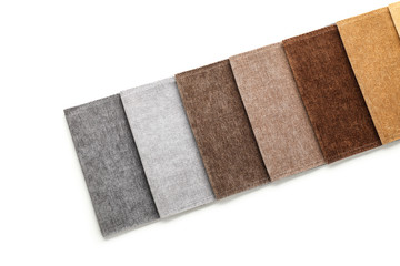 Fabric samples of different colors for interior design on white background