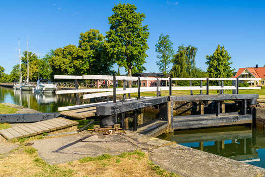 Closed canal lock with moored boats in the background. Location Berg, Sweden.