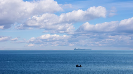 Sea, clouds and ships