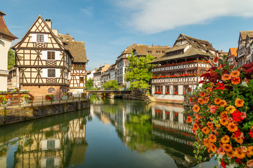 Fototapeta na wymiar Little France (La Petite France), a historic quarter of the city of Strasbourg in eastern France. Charming half-timbered houses. Famous Maison de Tanneurs house.