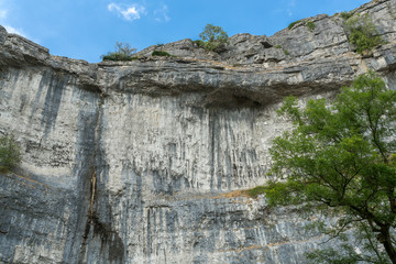 View of the curved cliff at Malham Cove in the Yorkshire Dales National Park