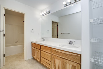 Fototapeta na wymiar Master bathroom interior with dual vanity.