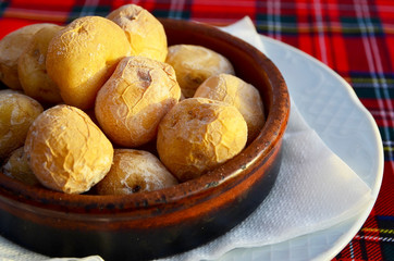 Naklejka na ściany i meble Wrinkled potatoes called papas arrugadas is a typical dish from Tenerife,Canary Islands, Spain.Selective focus. 