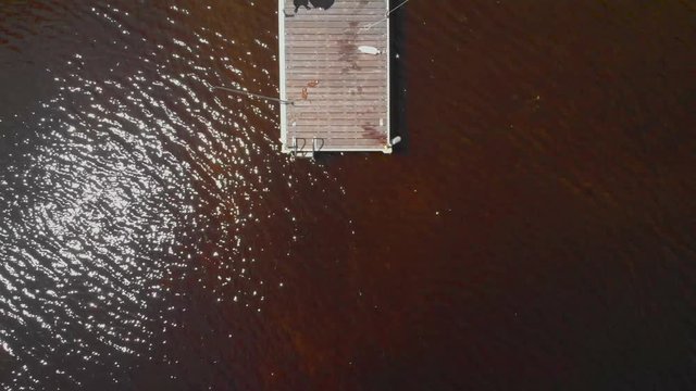 Looking down at the dock, followed by a slow rise.