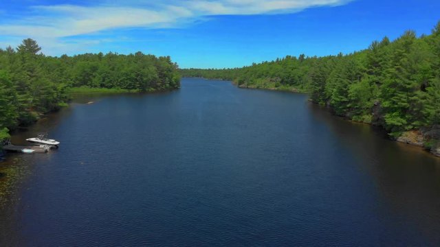 Pullback wide vista shot on DJI Mavic Air. Capturing the best of cottage country in Canada.