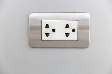 outlet white color on wall , power white color on wall