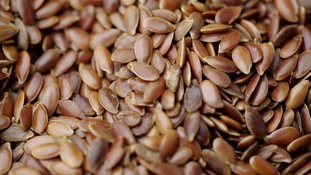 Flax seeds background. Close up.
