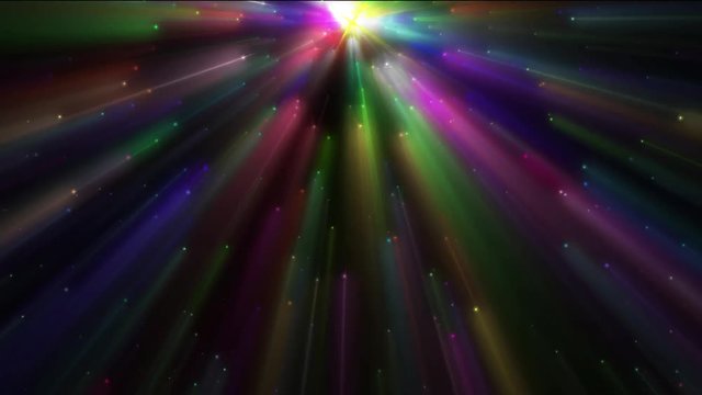 A  multi colored star field imploding into a concentration of energy