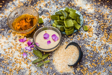 Close up of faithful home remedy for scars i.e Oats,aloevera gel and honey with some grains in...