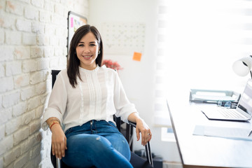 Woman sitting at her desk
