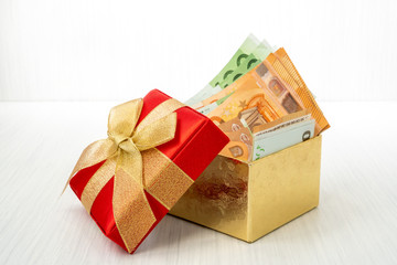 Euro currency inside the gift box