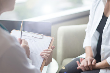 Healthcare concept of professional psychologist doctor consult in psychotherapy session or counsel diagnosis health. Major depressive disorder patient (MDD) with physician. - obrazy, fototapety, plakaty