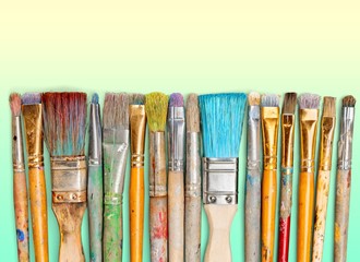 Row of artist paint brushes