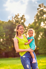Fototapeta premium happy family-Smiling mother and her little daughter.