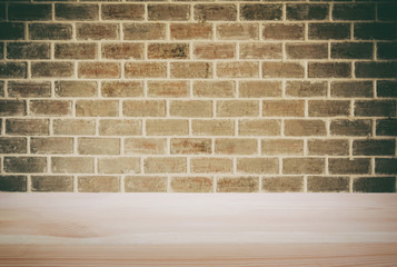Selected focus empty black wooden table and wall texture or old black brick wall blur background image. for your photomontage or product display