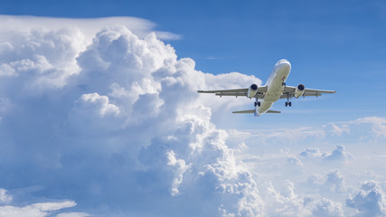 Airplane flying under blue sky 8