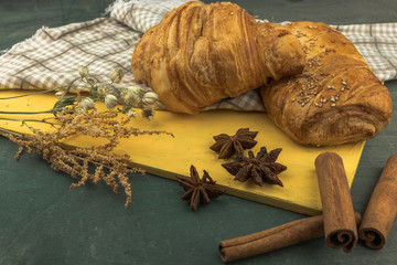 Breakfast Continental with many Fresh Croissants with Chocolate and sauce on a blue Background Delicious Baking Top View Copy space for Text