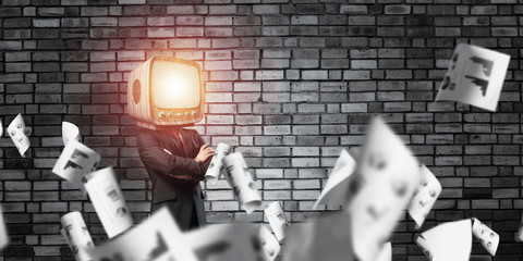 Businessman with old TV instead of head.