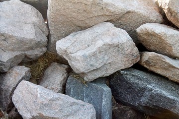 Large rocks and boulders in a pile.