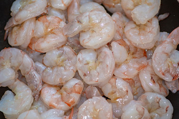Fresh washed shrimp just rinsed and prepped to be cooked.on the kitchen counter.