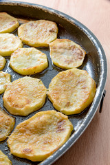Fried potatoes in the oven