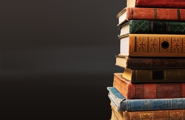 The ancient books on a dark background